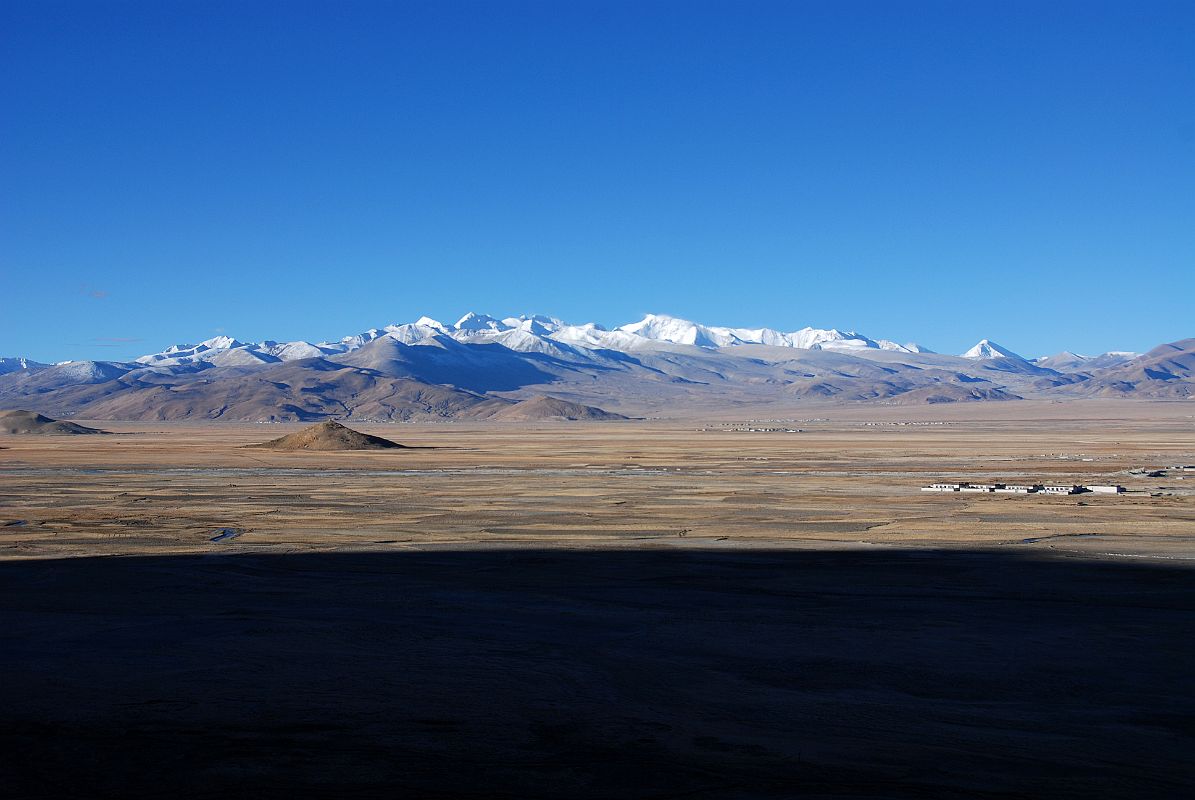 07 Labuche Kang III E and Labuche Kang I Early Morning From Across Tingri Plain The Labuche Kang massif is part of a beautiful mountain panorama viewed to the southwest from Tingri in the early morning. This massif has several summits over 7000m, including Lobuche Kang III East (7250m) in the centre and Labuche Kang (7367m, also called Lobuche Kang I or Choksiam) just to the right of centre.